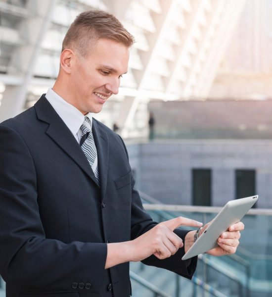 modern-businessman-using-tablet modern-businessman-using-tablet